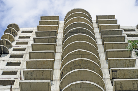 Unfinished building with semi-circular balconies. Bottom view.の写真素材