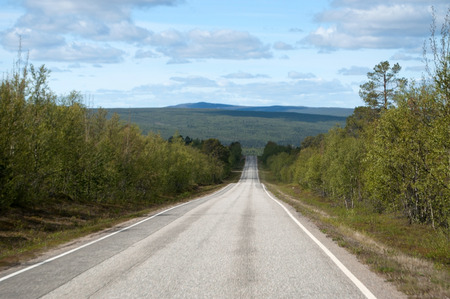 Photo of an empty street in Finland, Scandinavia at a sunny summer day.の写真素材