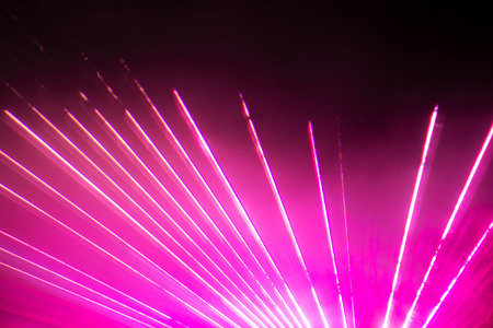 Photo taken during a lasershow with different colours..の写真素材