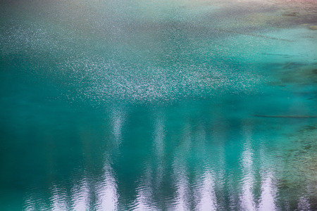 The Karersee, Italian Lago di Carezza, is a lake in the Dolomites in South Tyrol, Italy.の写真素材