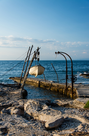 Savudrija is a coastal settlement in northwestern Istria, Croatia and known for its hanging boats.の写真素材