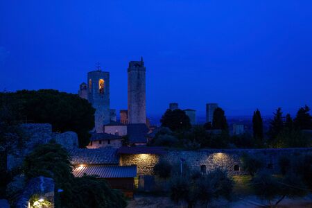 San Gimignano is a small walled medieval hill town in the province of Siena, Tuscany, Italy. Known as the Town of Fine Towers, San Gimignano is famous for its medieval architecture,の写真素材