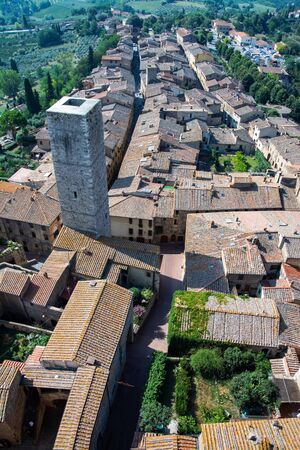 San Gimignano is a small walled medieval hill town in the province of Siena, Tuscany, Italy. Known as the Town of Fine Towers, San Gimignano is famous for its medieval architecture,の写真素材