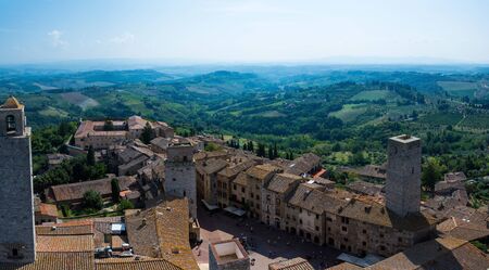San Gimignano is a small walled medieval hill town in the province of Siena, Tuscany, Italy. Known as the Town of Fine Towers, San Gimignano is famous for its medieval architecture,の写真素材