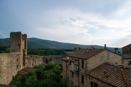 Monteriggioni is a medieval walled town, located on a natural hillock, built by the Sienese in 1214â19 as a front line in their wars against Florence.の写真素材
