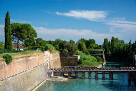 Peschiera del Garda is an Italian commune in the province of Verona, Veneto region. Parts of the old town with their fortifications separate the town from the mainlandの写真素材
