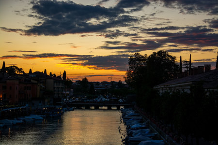 Peschiera del Garda is an Italian commune in the province of Verona, Veneto region. Parts of the old town with their fortifications separate the town from the mainlandの写真素材