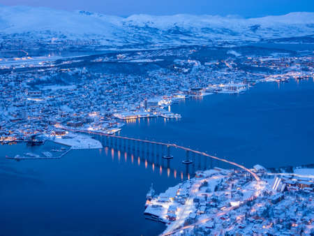 The Tromso Bridge is a road bridge in the city of Tromso which is located in Tromso Municipality in Troms og Finnmark county, Norway. It crosses the Tromsoysundet strait between Tromsdalen on the mainland and the island of Tromsoya.の写真素材