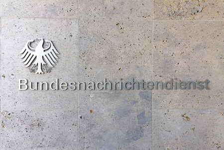 Logo of the German Federal Intelligence Service Bundesnachrichtendienst BND at the entrance to the new headquarters of the BND in the German capital Berlin on the Chausseestrasse - Germany.のeditorial素材