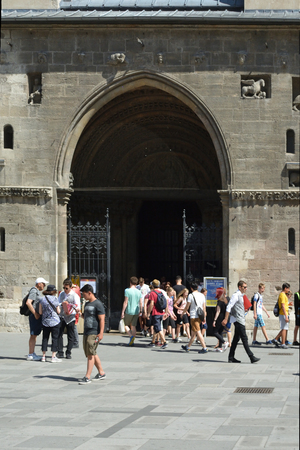 People in front of the main portal of St Stephens Cathedral on the Stephansplatz in Vienna - Austriaのeditorial素材