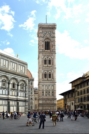 Tourists in front of the Giotto's campanile and the Cathedral Santa Maria del Fiore on the Piazza Duomo in Florence - Italy.のeditorial素材