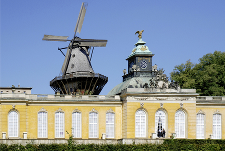 The New Chambers in the palace garden of Sanssouci in Potsdam with the historical windmill - Germany.のeditorial素材