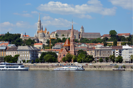 View across the river Danube to the historic buildings in Buda with Matyas church, Fishermen's Bastion and Calvin's church in Budapest - Hungary.のeditorial素材