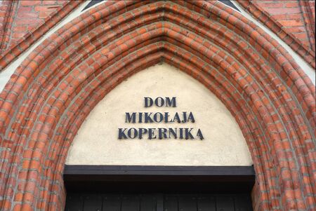 Portal of the Birth house of the astronomer and mathematican Nicolaus Copernicus with the Copernicus Museum in Torun - Poland.のeditorial素材