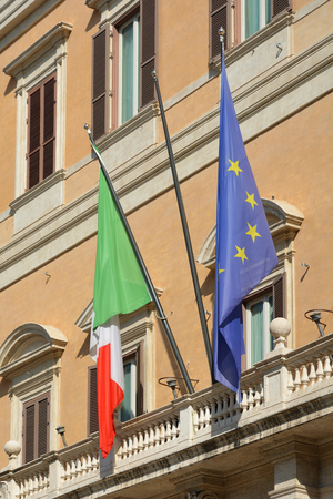 Palazzo Montecitorio at the Piazza Montecitorio in the old town of Rome. Seat of the Representative chamber of the Italian parliament - Italy.のeditorial素材