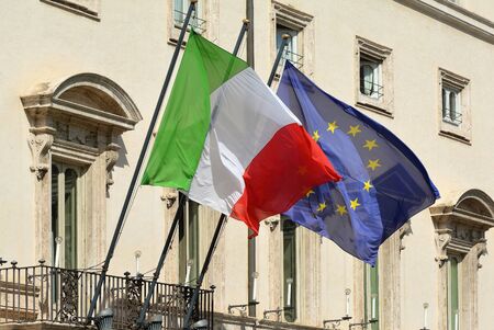 Flags at the Palazzo Chigi at the Piazza Colonna in Rome. Residence of the Italian Prime Minister - Italy.のeditorial素材