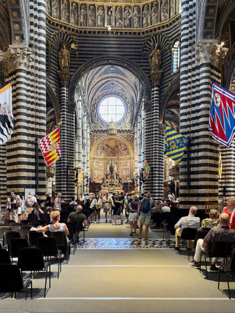 Tourists in the Cathedral of Santa Maria Assunta in Siena - Italy.のeditorial素材