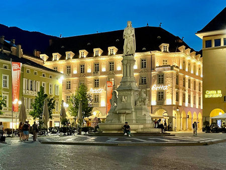 Walther Square in Bolzano in South Tyrol. with Monument to the poet Walther von der Vogelweide in the evening - Italyのeditorial素材