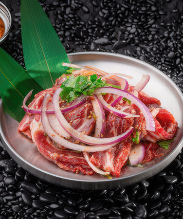 Korean traditional food, Sliced raw beef in a bowlの写真素材