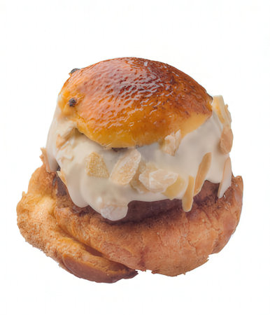 Bun with vanilla ice cream and caramel on a white background.の写真素材