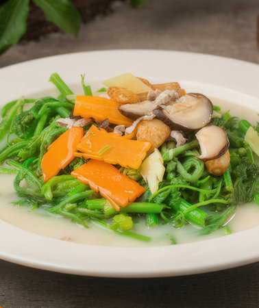 stir-fried vegetable,Thai style food in white dishの写真素材