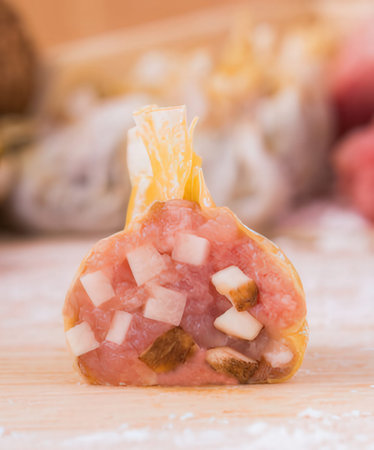 Pistachio and ham rolls on a wooden board. Selective focus.の写真素材