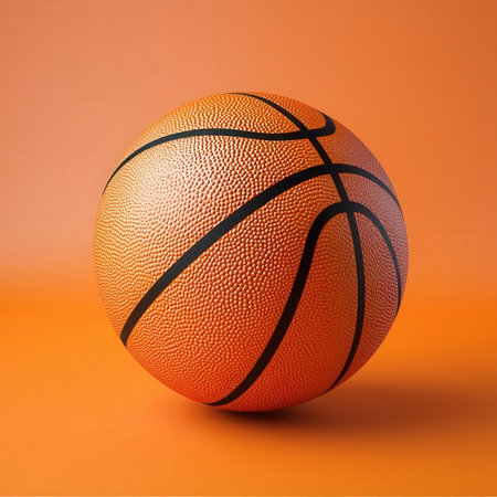 Basketball ball on an orange background. 3d render image.の素材