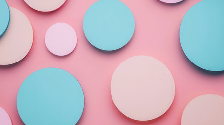 Colorful paper circles on pastel pink background. Minimal conceptの素材