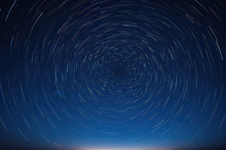 Star trails in the night starry sky. Long exposure photograph.の写真素材