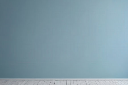 Blue wall and white wooden floor in empty room with copy space.の写真素材