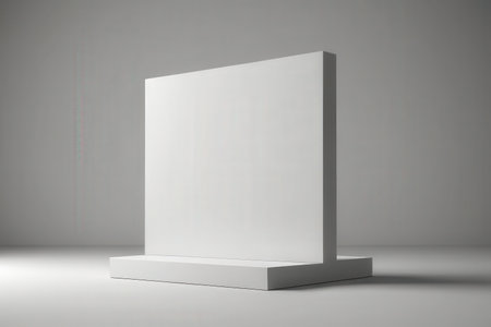 3D rendering of a white pedestal on a gray background.の写真素材