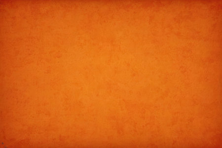 Grunge orange background with space for your text or image.の写真素材