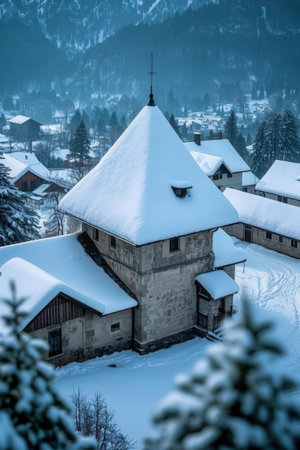 Winter landscape with old wooden church in Bled, Slovenia, Europe.の素材