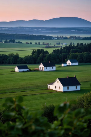 Beautiful rural landscape in Bavaria, Germany. Rural landscape with small village and fields.の素材