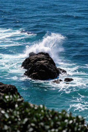 Beautiful seascape with big waves crashing on the rocks.の素材