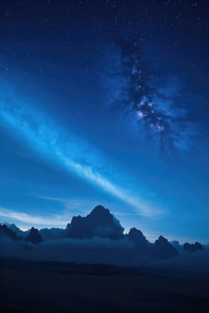 Milky Way over the mountains at Phu Kradueng National Park, Thailandの素材
