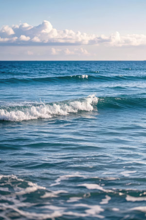 beautiful sea and blue sky with clouds - soft focus and vintage effectの素材
