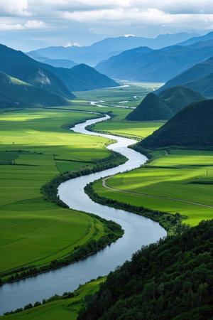 Beautiful landscape of the mountains and the river in the valley.の素材