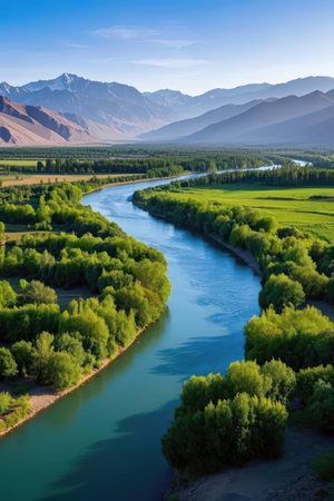 Beautiful landscape of turquoise river and mountains in the backgroundの素材