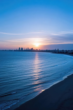 Sunset on the beach in Tel Aviv, Israel. Beautiful nature background.の素材
