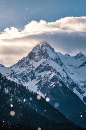 Snowfall in the mountains. Winter landscape with snow covered mountains.の素材