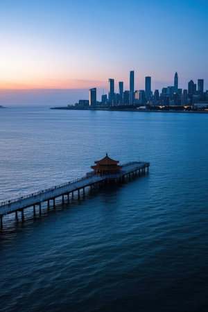 Pier and skyline of Pattaya city at sunset, Thailand.の素材