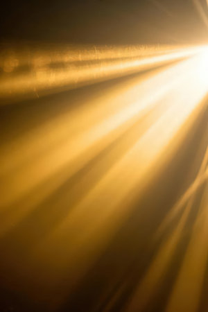 blurred of car on road with sunbeams and lens flareの素材