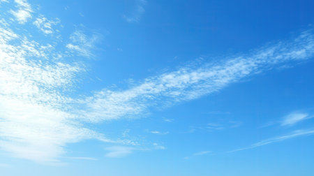 Blue sky background with tiny clouds, blue sky background with tiny cloudsの素材