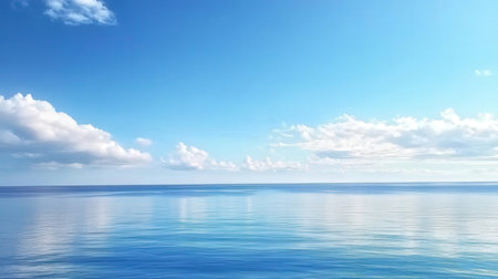 Beautiful seascape with blue sky and clouds reflected in waterの素材