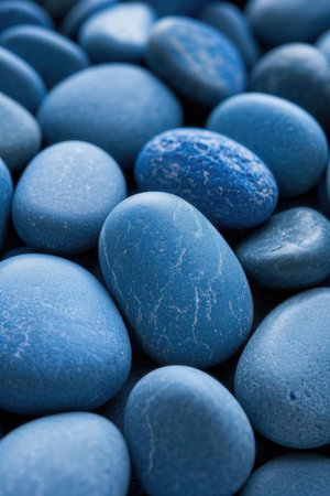 Blue pebbles background. Blue pebbles texture background.の素材