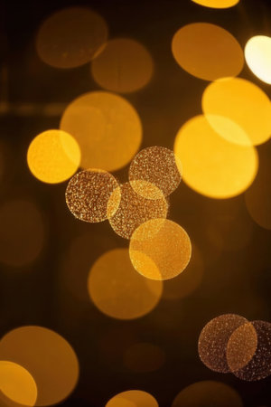 Abstract golden bokeh background. Christmas and New Year concept.の素材