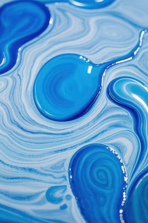 abstract background from blue and white oil paint in water closeupの素材