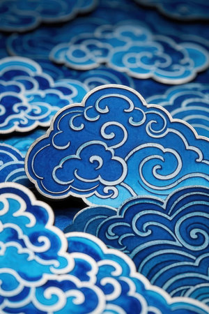 Clouds made of paper on blue background. Close-up.の素材
