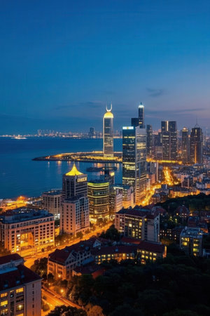 Aerial view of Qingdao city at night, China.の素材